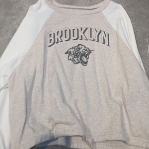BROOKLYN TIGERS cream and white long sleeve shirt.